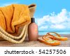 صور شواطىء وبحار  Stock-photo-suntan-lotion-flip-flops-with-towel-at-the-beach-54257506